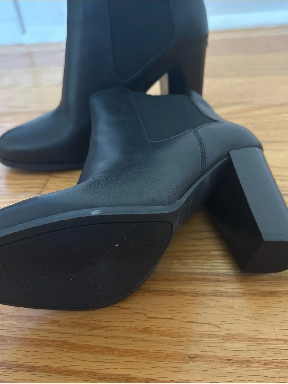 Michael Kors Black Leather Chelsea Block Heel Booties with Metal Accent